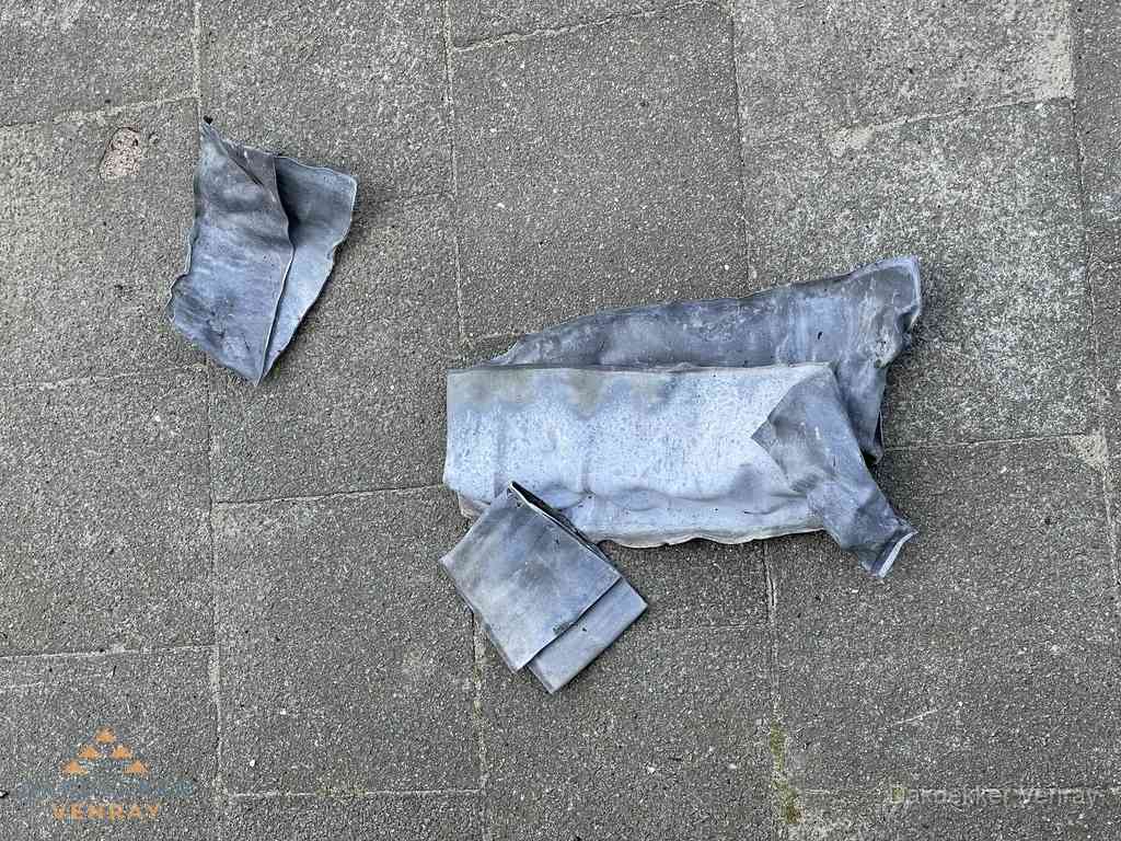Oude verwijderde loodslabben na vervanging in Venray